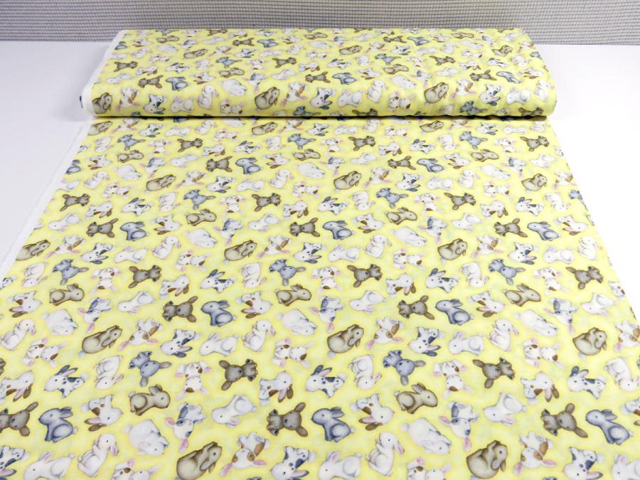 Preview: Patchworkstoff mit Hasenbabies auf gelb von Henry Glass Fabrics